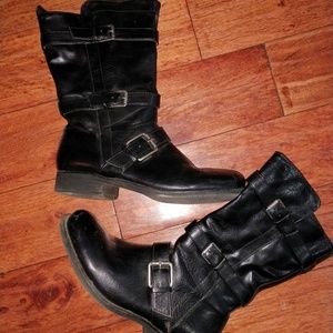 Black mid calf rise boots with buckle accents